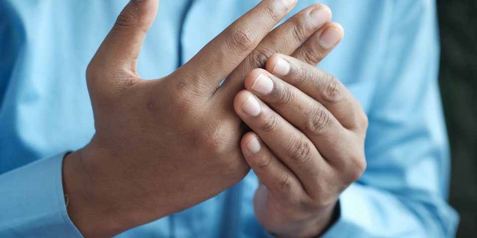 Person holding other hand