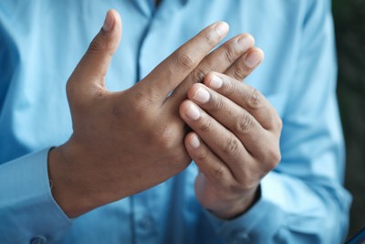 Person holding other hand