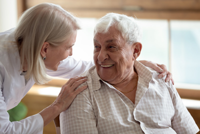 woman and man smiling at each other