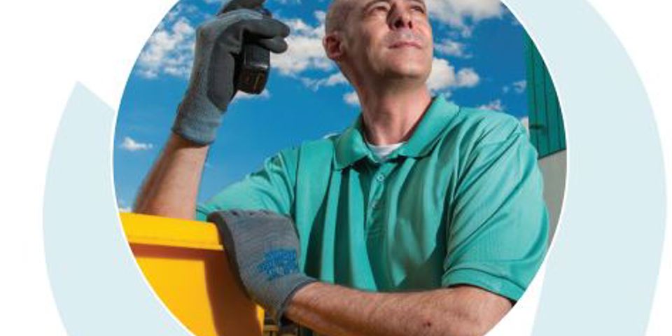 nonclinical staff member outside with walkie talkie