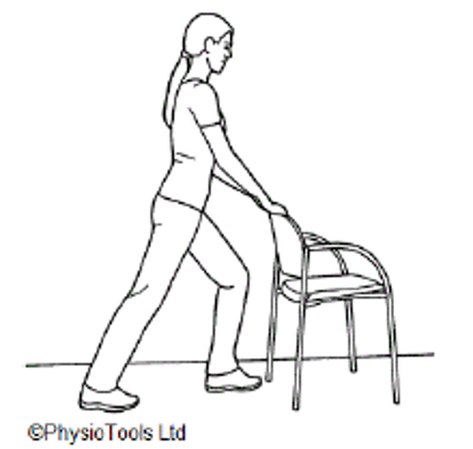 woman pushing against chair leg exercise