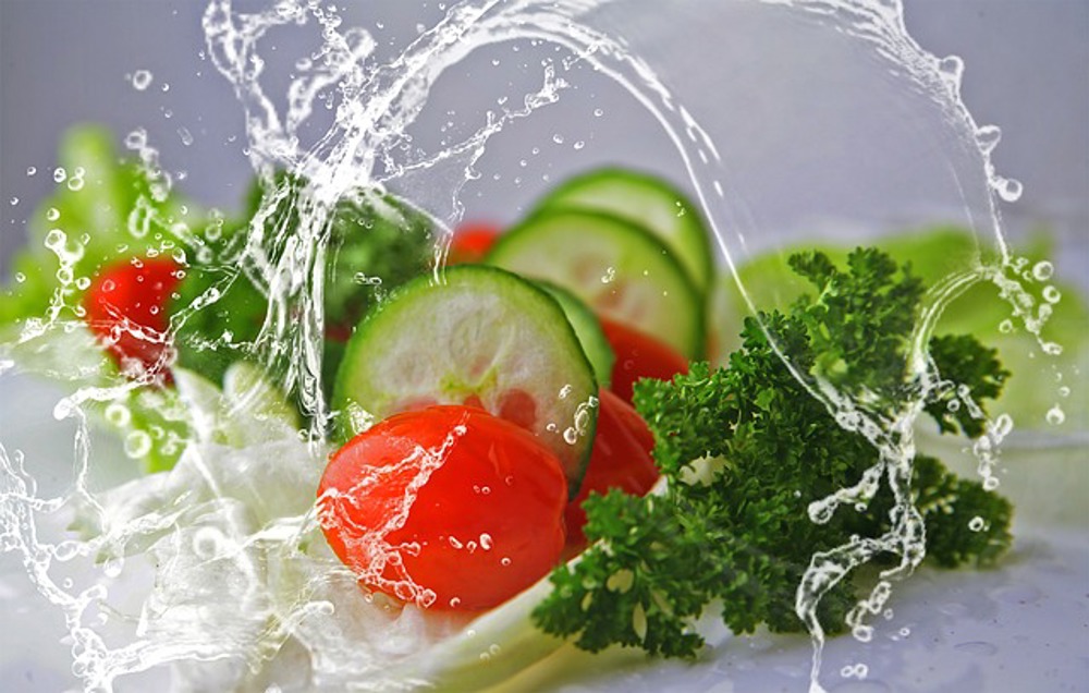 Water splash over salad